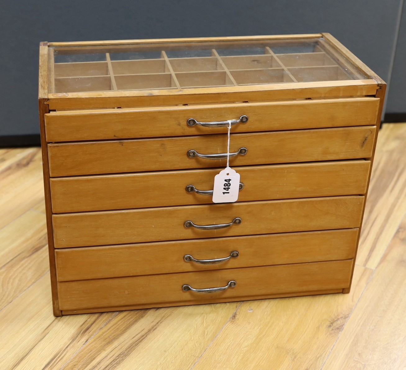 A tailors wooden five drawer counter top display cabinet, 36.5cm high, 48cm wide, 39cm deep